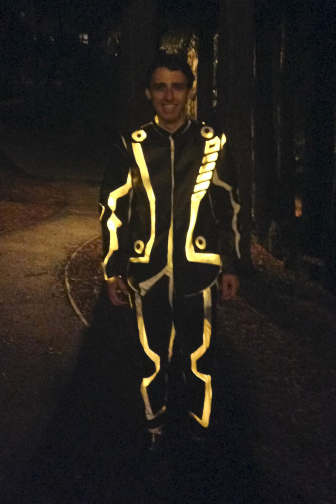 person wearing light-up Halloween costume of the character Clu from the movie Tron Legacy