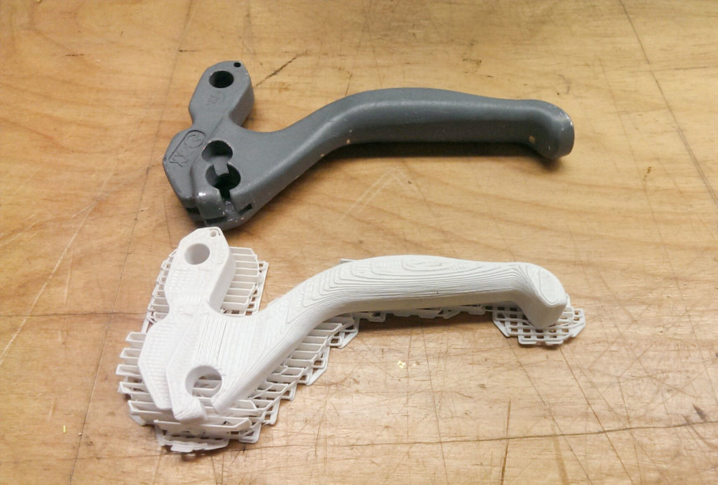comparison of 3D printed bicycle brake lever with the original