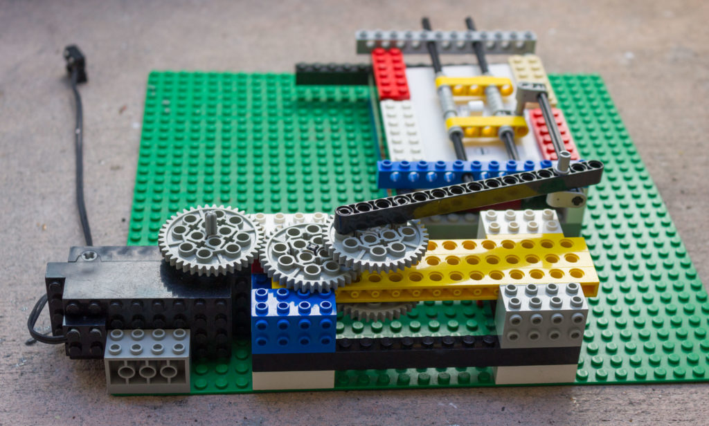 Detail of Switchbot proof-of-concept using Lego